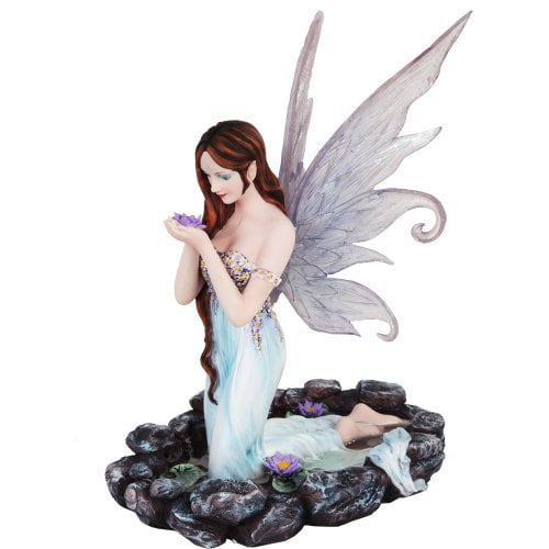 fairy kneeling . made from cast resin garden ornament